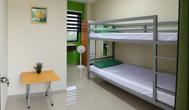 Wide view of the sleeping area at Rohan’s Boarding House in Alae, Manolo Fortich